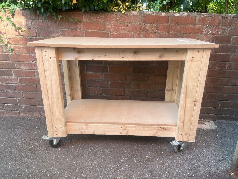 Work bench on heavy duty wheels