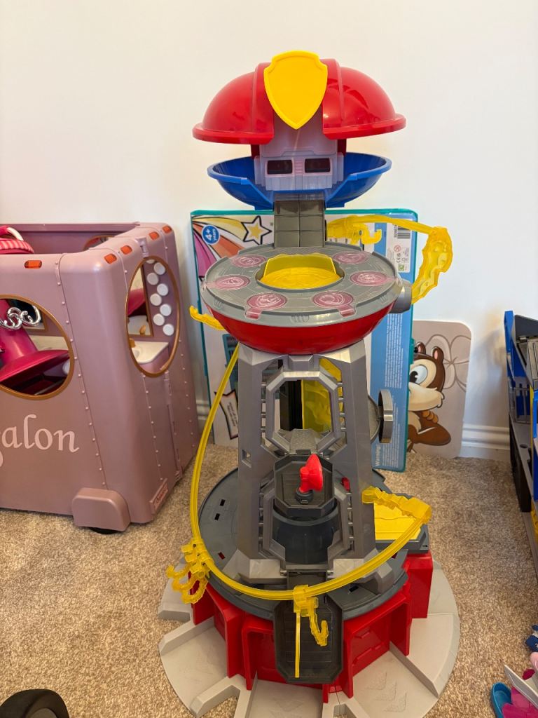 Paw patrol tower and various vehicles and pups