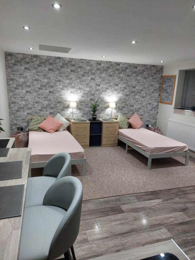 Newly Renovated Room with Attached Bathroom and Small Kitchen 