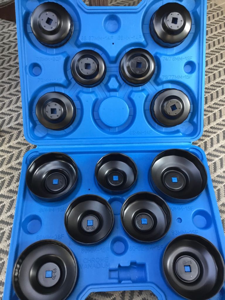 Oil filter wrench removal tool