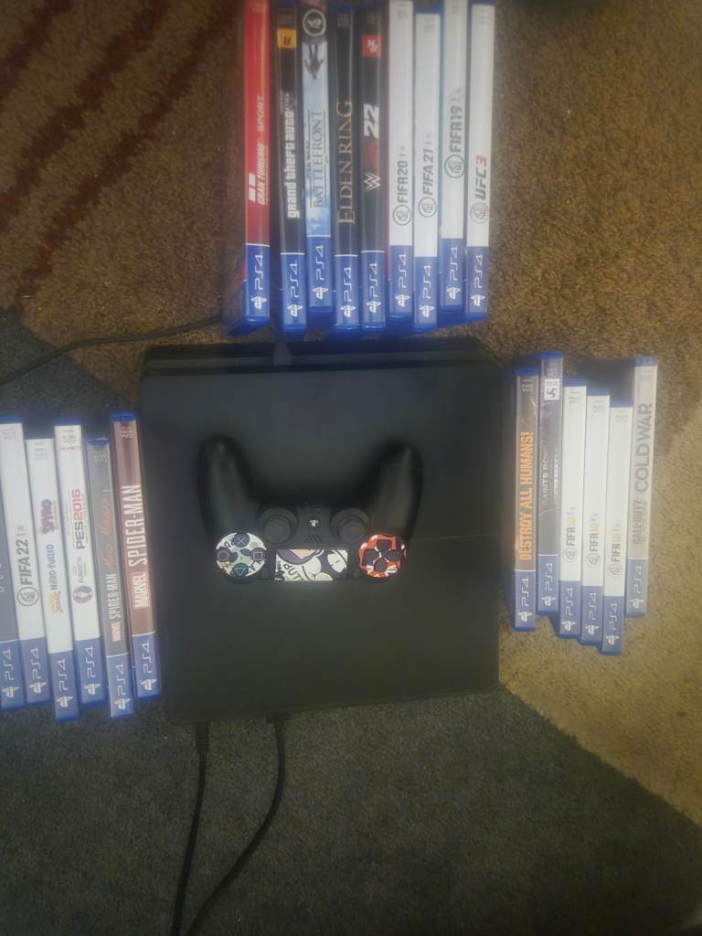 PS4 Console with 22 Games and Controller – Good Condition