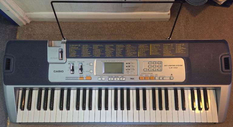Casio LK-110 Electric Keyboard – Good Condition