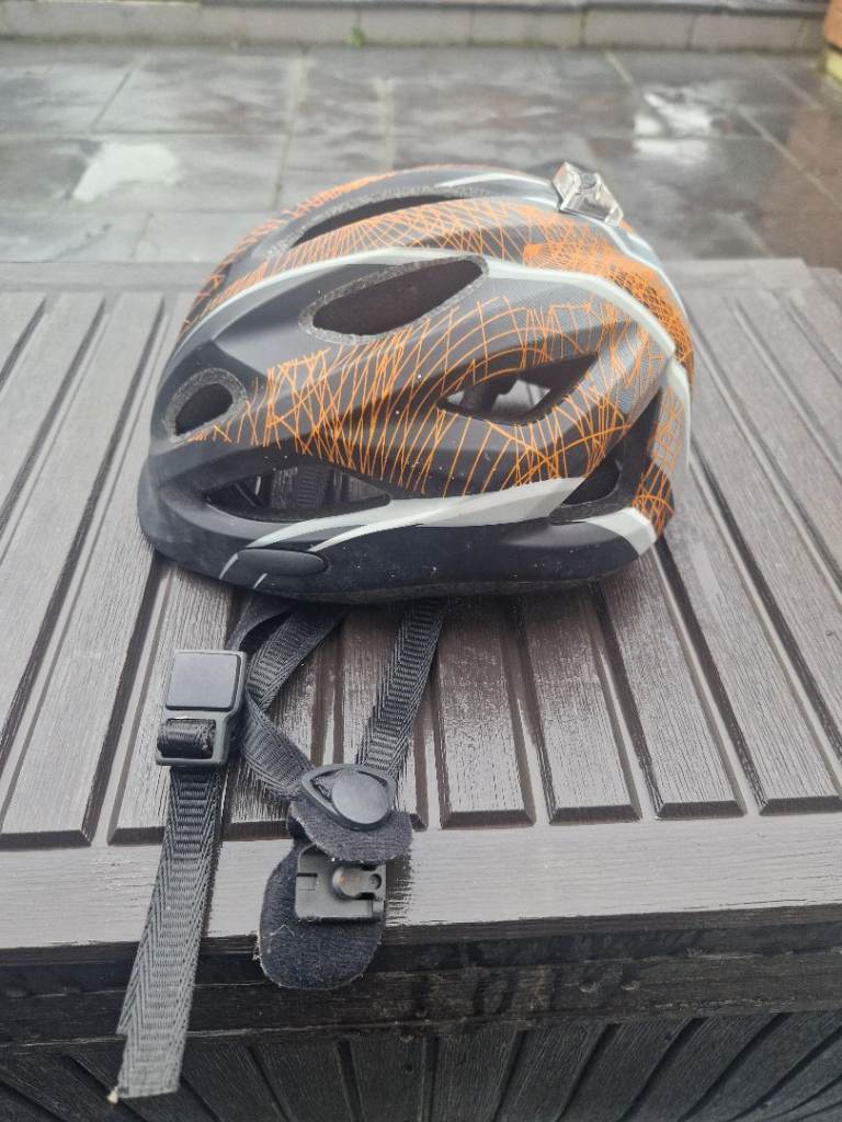 Kids bike Helmet size small (48-54cm)  Adjustable straps  as light on back but needs new battery