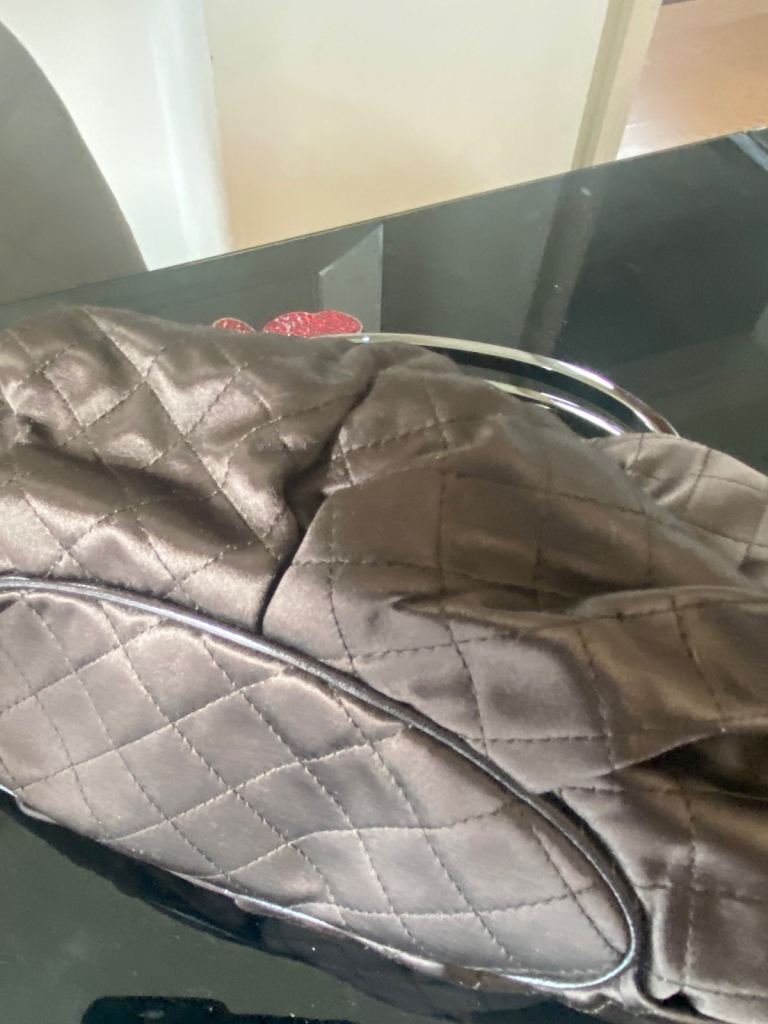 Stylish Brown Quilted Handbag with Heart Detail – Good Condition