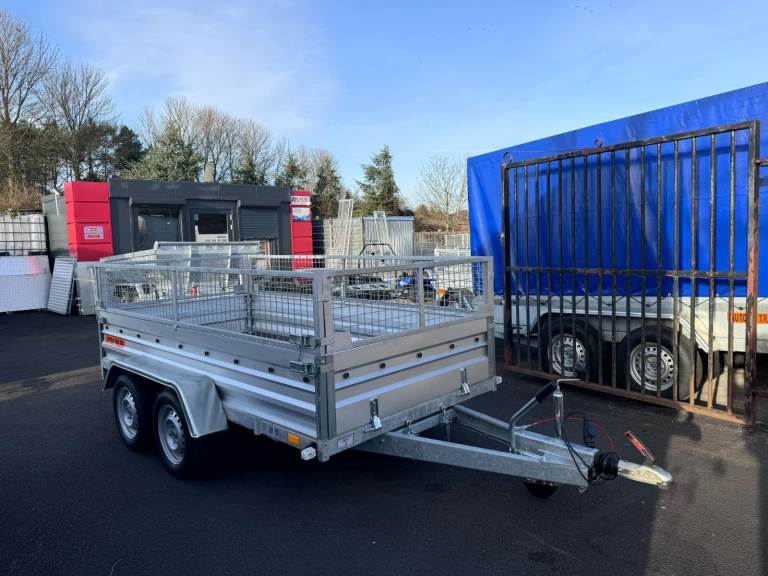 BRAND NEW 10ft x 5ft TWIN AXLE TRAILER WITH 40CM MESH 1300KG BRAKED
