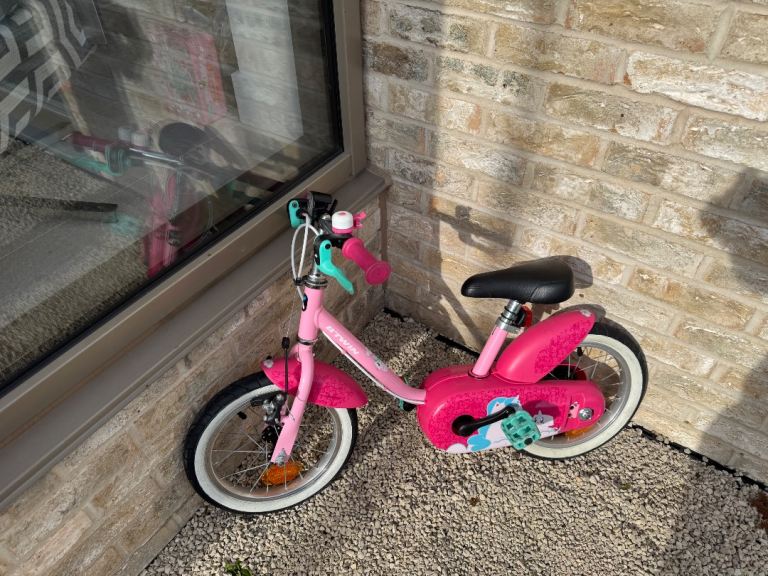 BT Win Unicorn 500 Bike in good condition with stabilisers