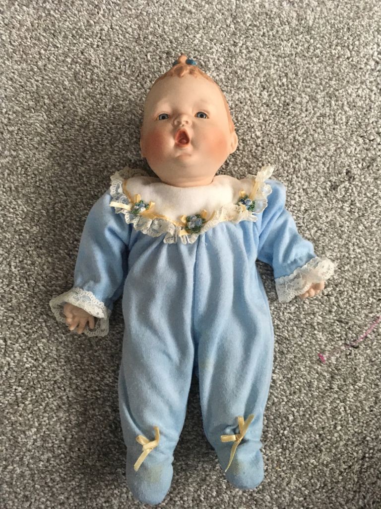 Ceramic baby doll. 