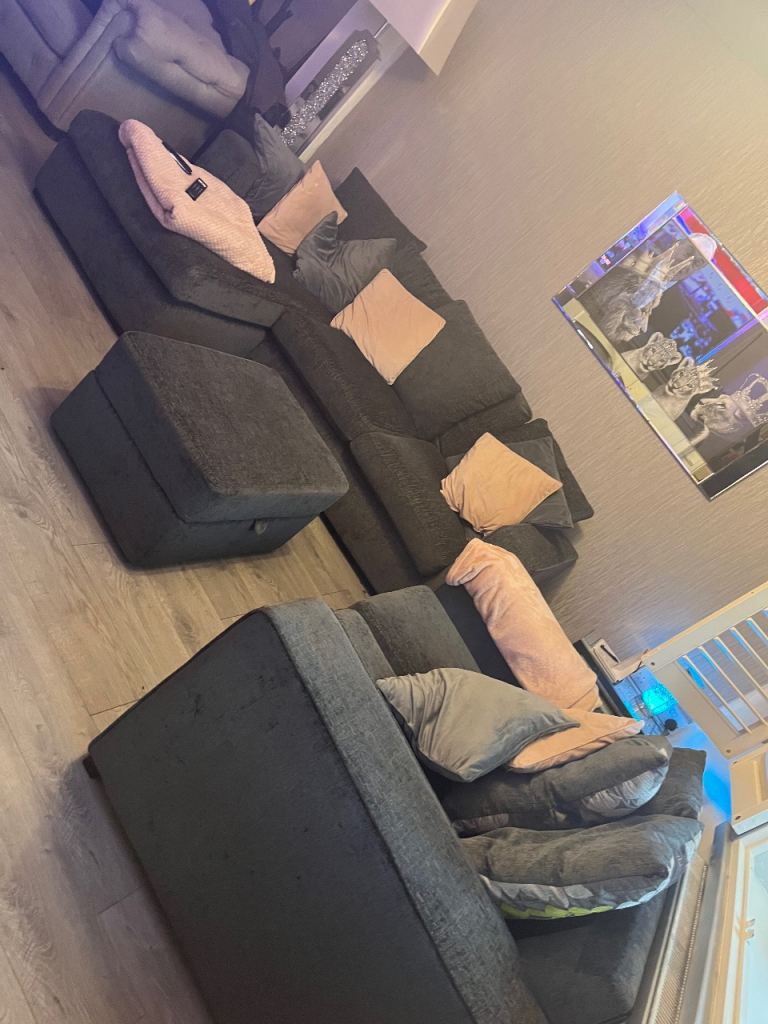 Grey fabric corner chaise sofa and 2 seater and foot stool 