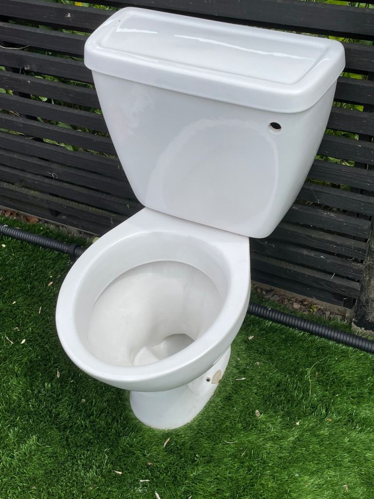 White Toilet with Thermoplastic Seat and Dual Flush Valve