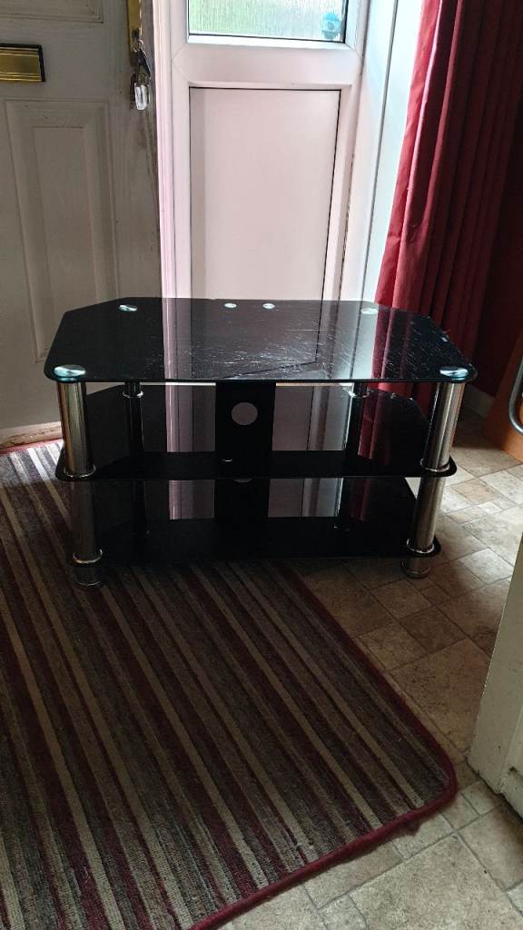 Free glass tv stand with shelf 