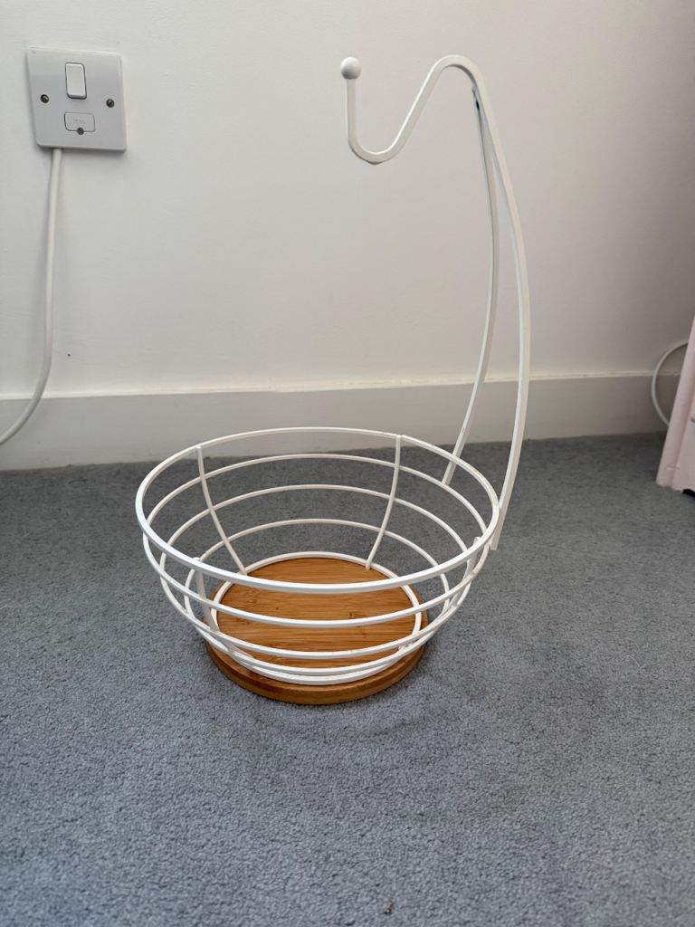 White metal and wooden fruit bowl 