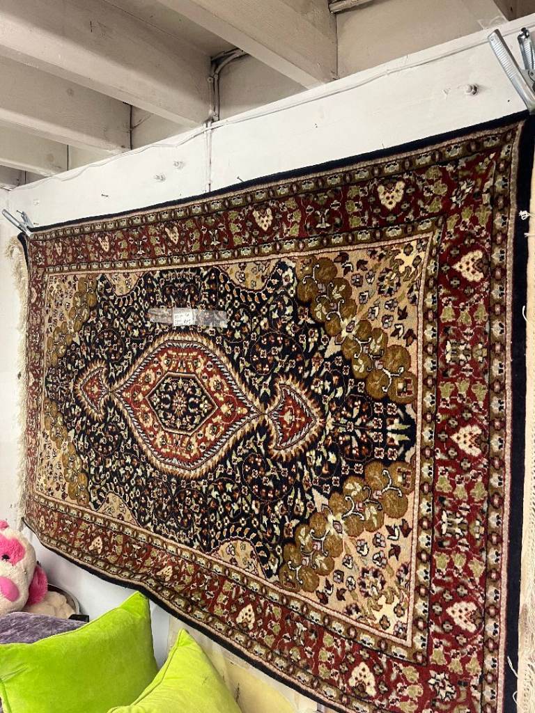 Persian Wool Rug , great colours . blues and reds .  Size - 190cm x 120cm