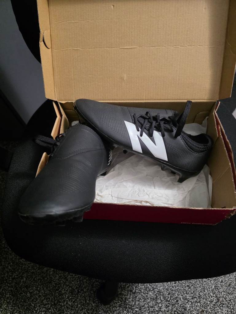 New Balance size 4 football boots
