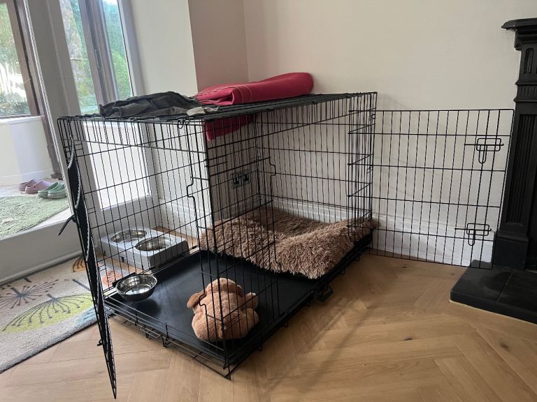 Dog crate 42” great condition (including crate bed if desired)