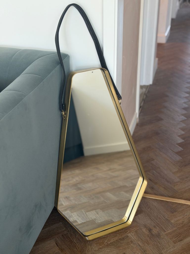 Brass framed mirror with leather hanging strap