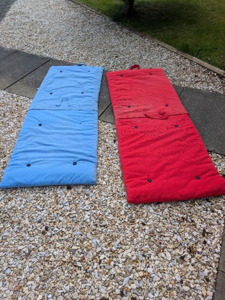 Two roll-up futon matresses