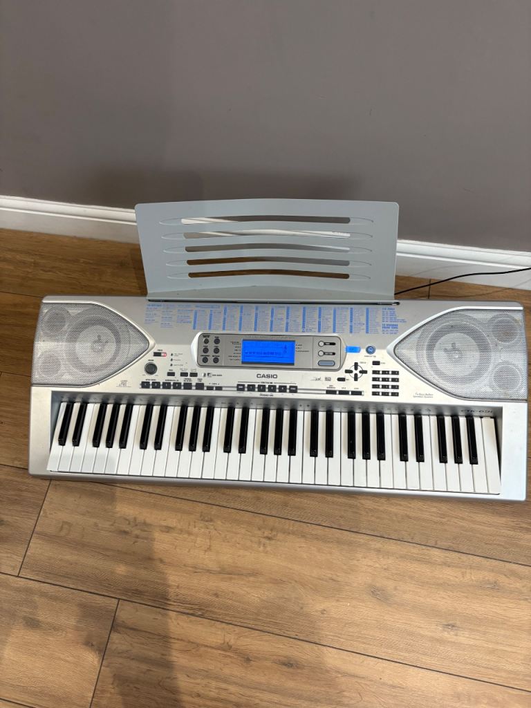 Casio CTK-691 Electronic Keyboard with Stand – Good Condition