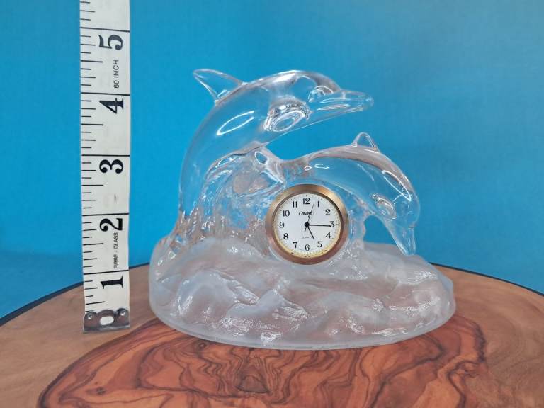 Very nice Crystal Glass Dolphins Clock Works well.. good condition. 
