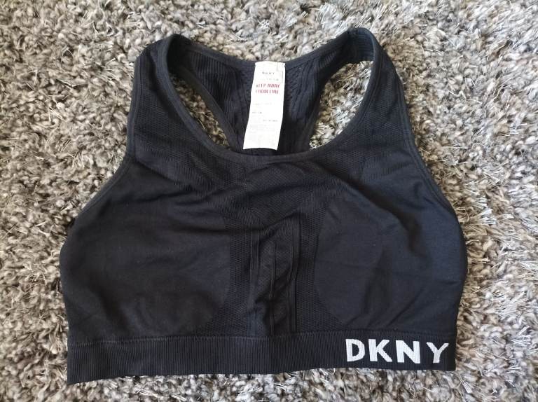 Black DKNY sports bra (brand new no tags size L) £5 & black (brand new) Avon soft bra size L £3