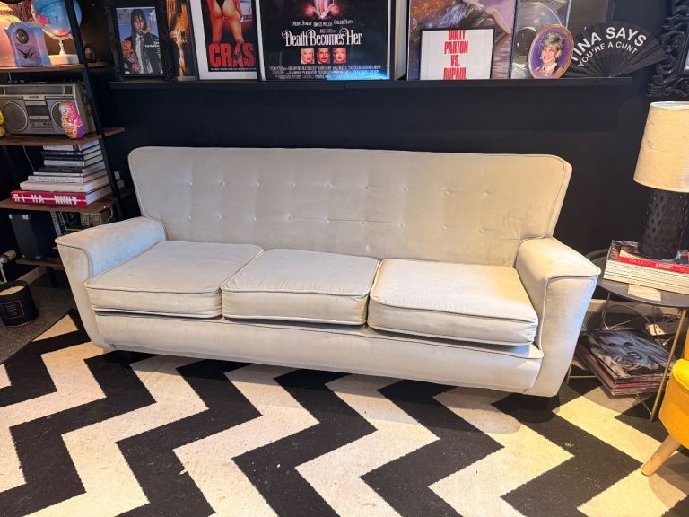 Three seater grey velvet sofa
