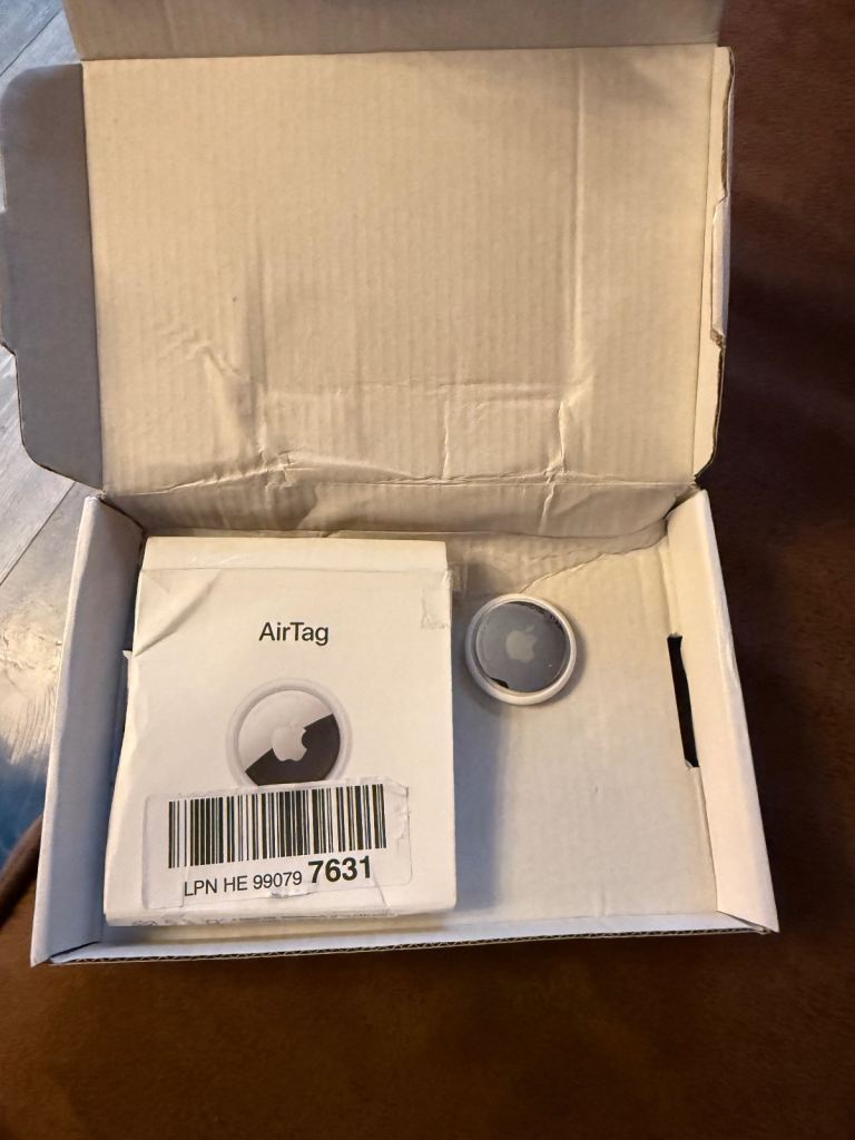 Apple Air Tag tracker, boxed still linked to previous owner Apple ID 