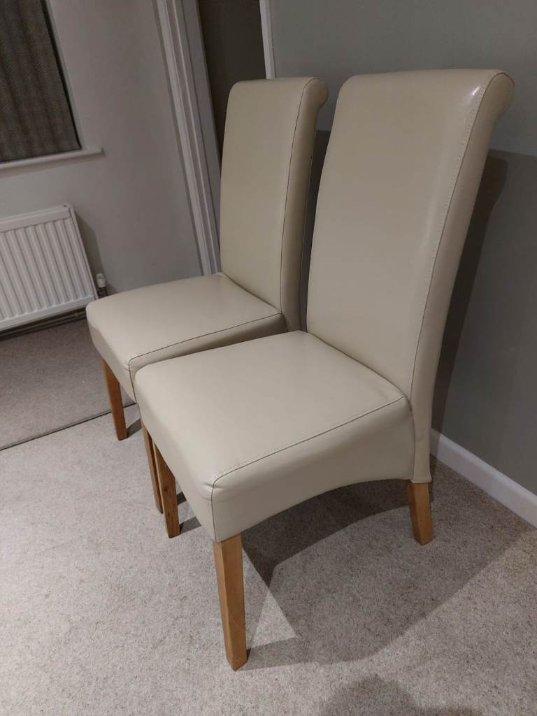 Cream Leather dining room chairs