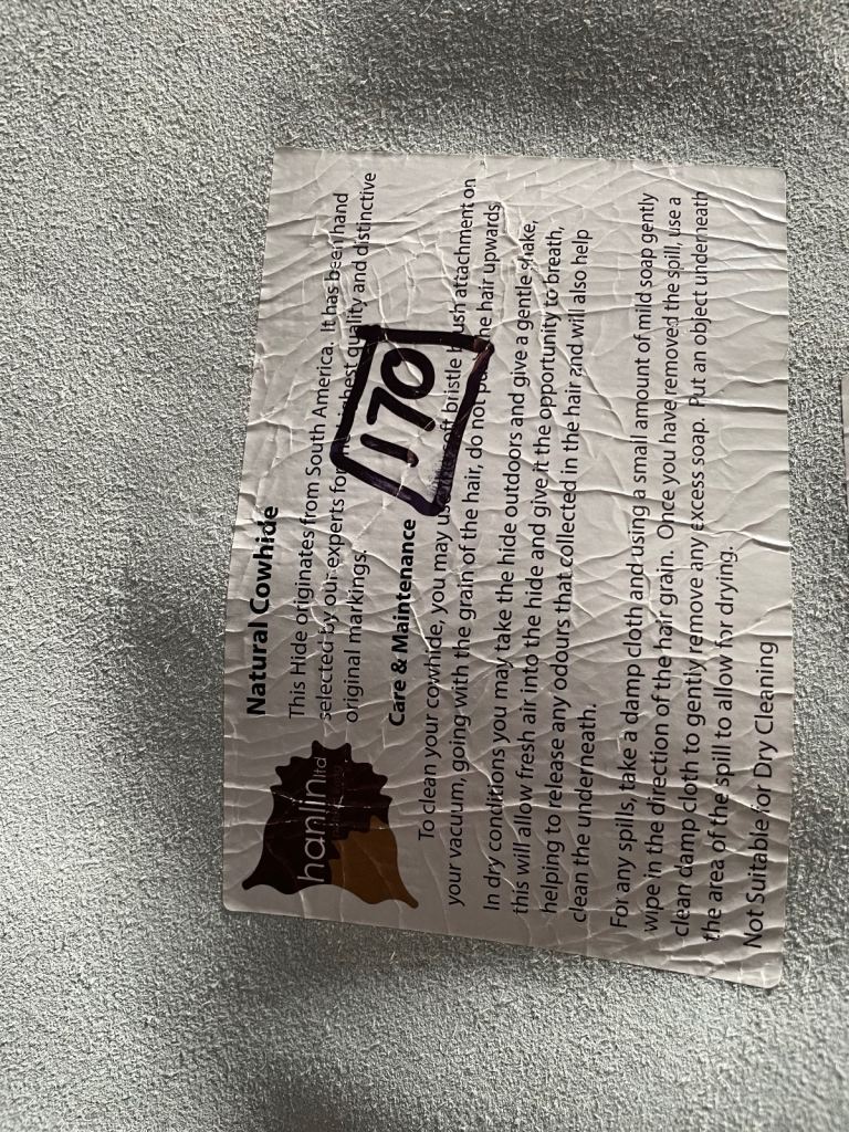 Black and white cow slip rug