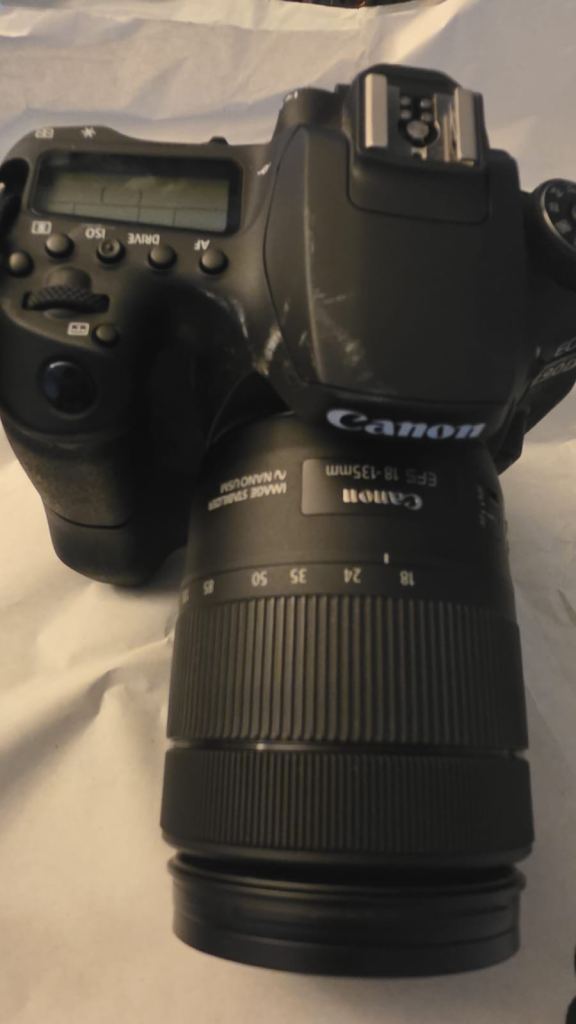 Selling my Canon EOS 90D DSLR camera with lens and battery grip.