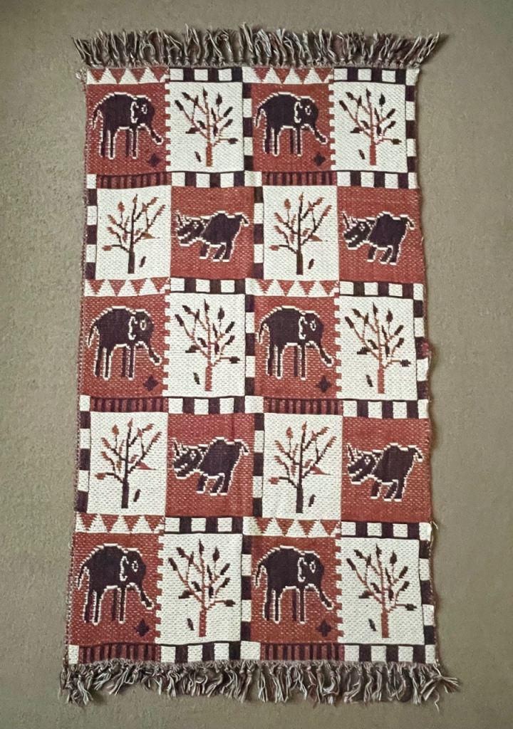 HAND-LOOMED AFRICAN RUG FROM NAMIBIA (ELEPHANT & RHINO)