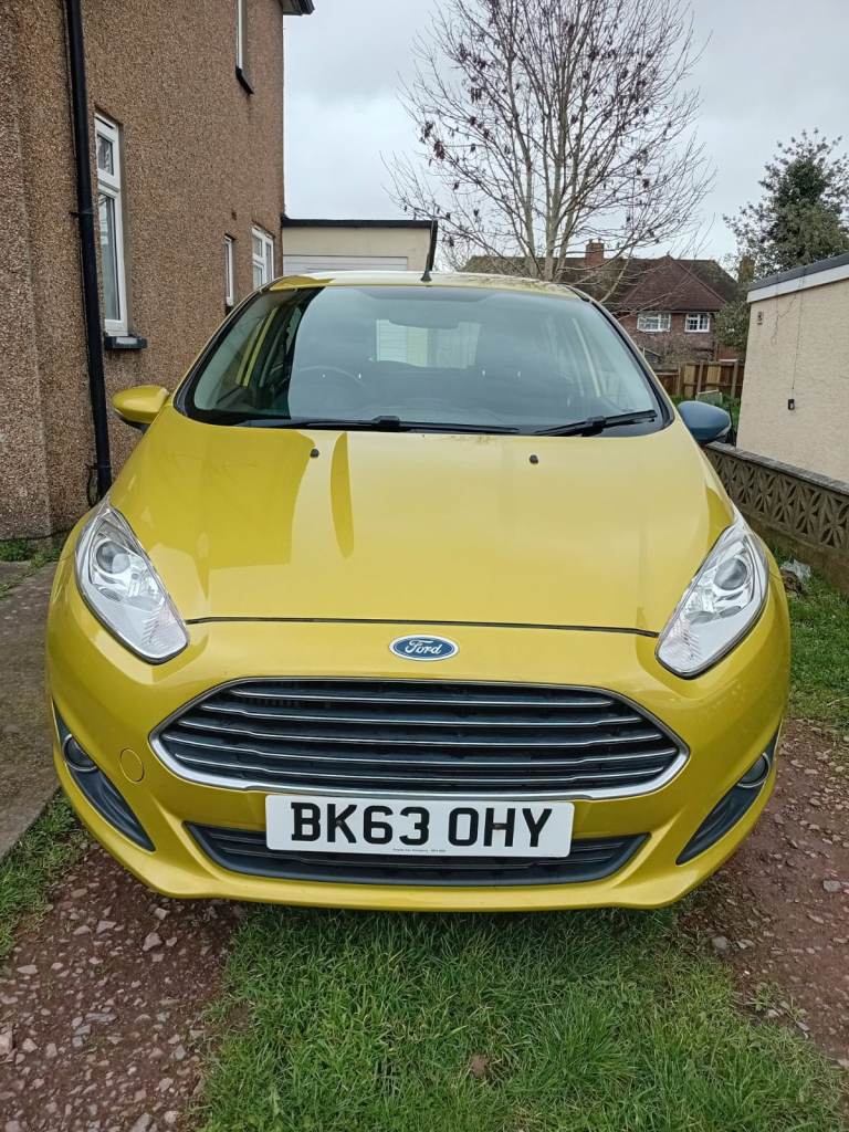 Ford Fiesta diesel, 60+ mpg, reliable and cheap to insure.