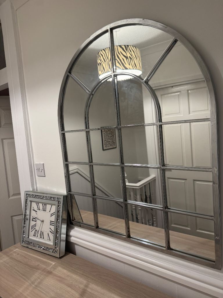 Mirror and wall clock 