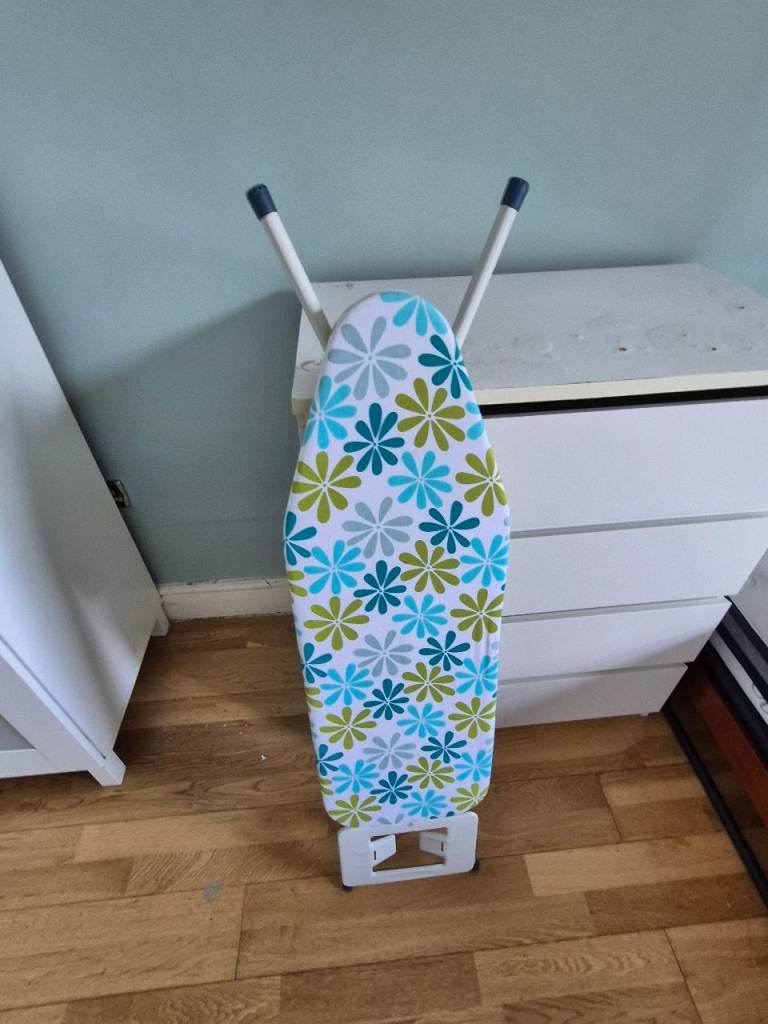 Good Condition Ironing Board with Floral Cover