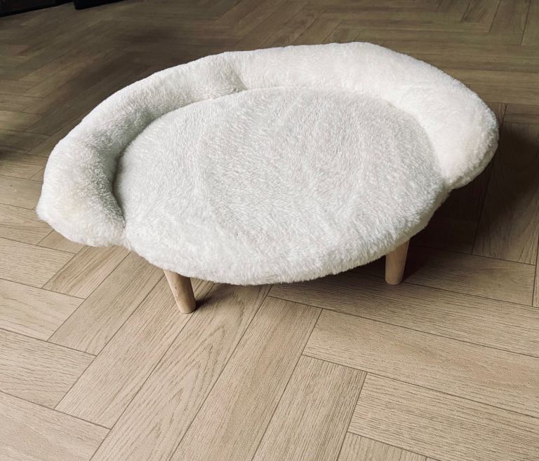 Cat / small dog comfy bed, cream fur with wooden legs. Collection Sheffield S36 