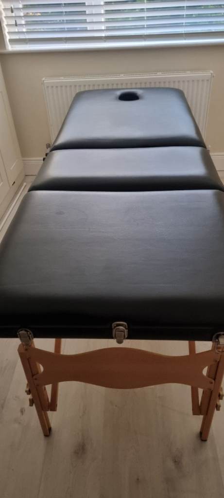Massage table