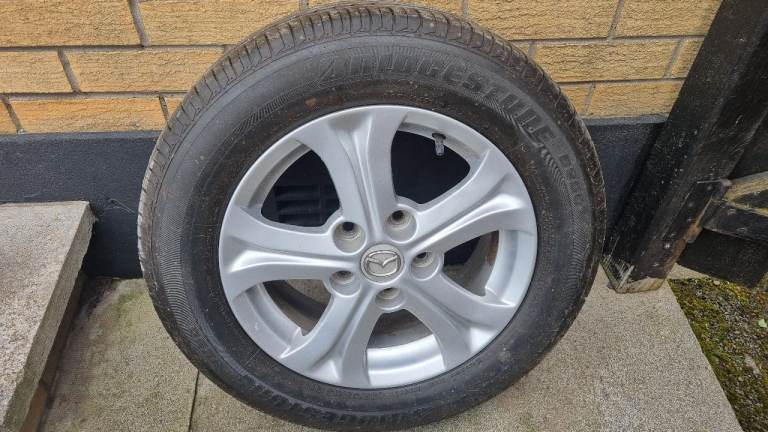Mazda 16" rim with Bridgestone tyre