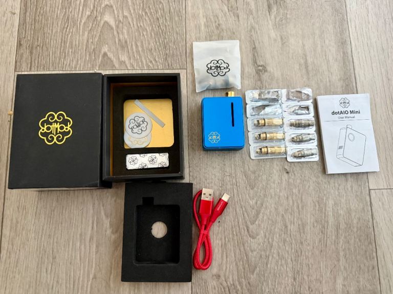 DotMod dotAIO Mini vape kit in blue, boxed with accessories as shown in the photos.