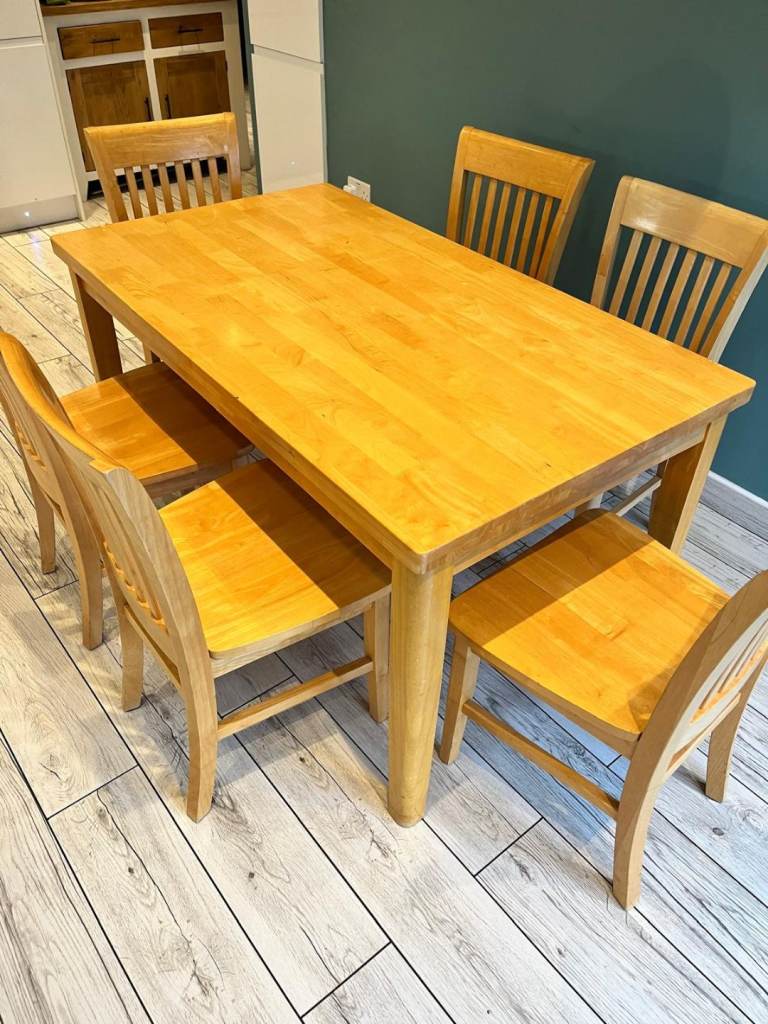 image for Solid malaysian wooden table and chairs