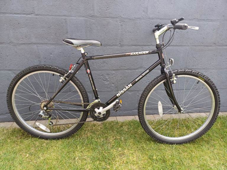 A “NEW and UNUSED” SARACEN NISSAN SPECIAL EDITION MTB BIKE in JET BLACK 