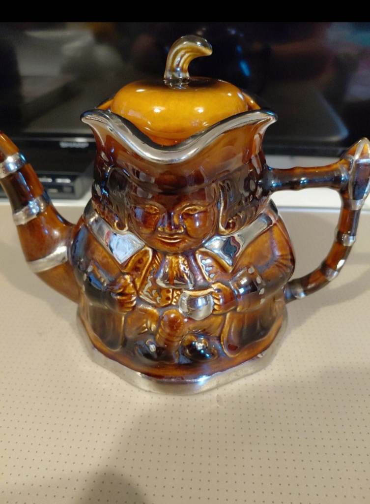 Vintage Ceramic Teapot with Silver Trim – Unique Design