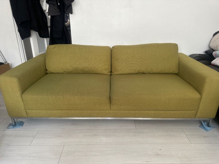 IKEA used green sofa with additional black cover