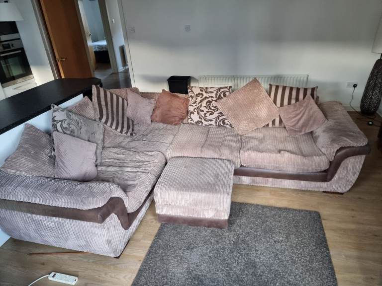 Corner sofa with storage footstool