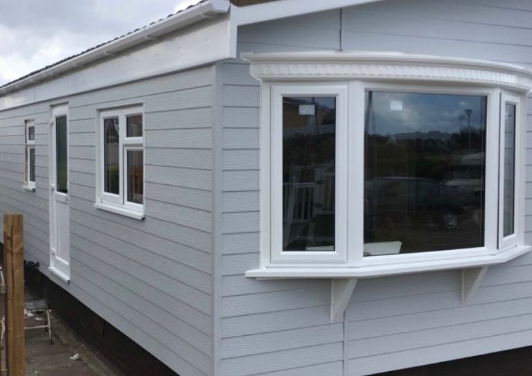 Mobile home to rent static holiday lodge on quiet private country park 