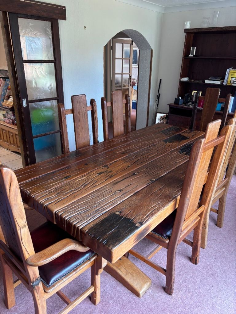 Jarabosky wooden sleeper dining table and 8 chairs 