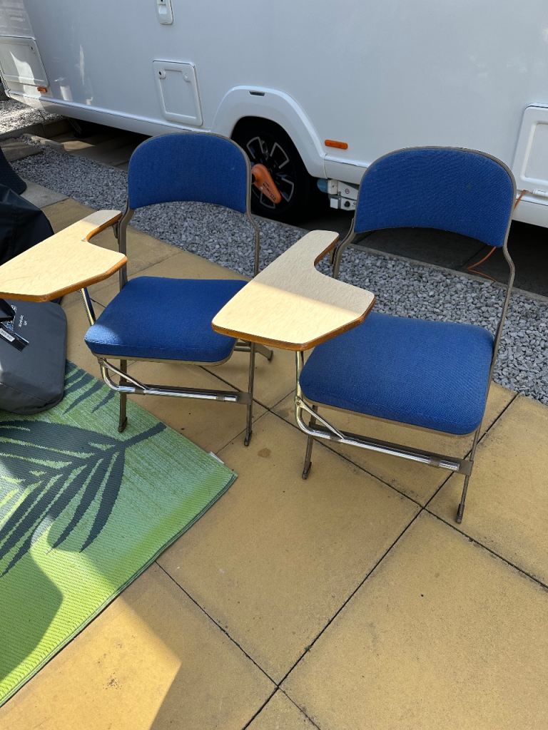 Pair of Blue Folding Chairs with Writing Tablets – Good Condition