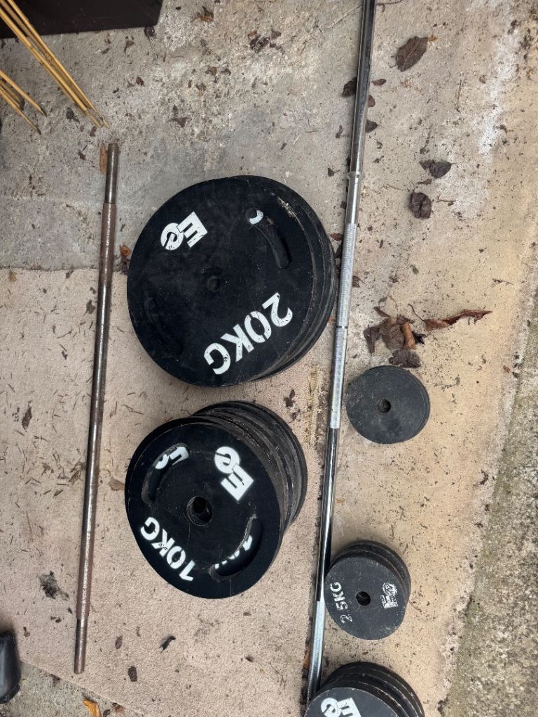 Weight Plates, Barbells, bench, squat rack and lat/ rope machine