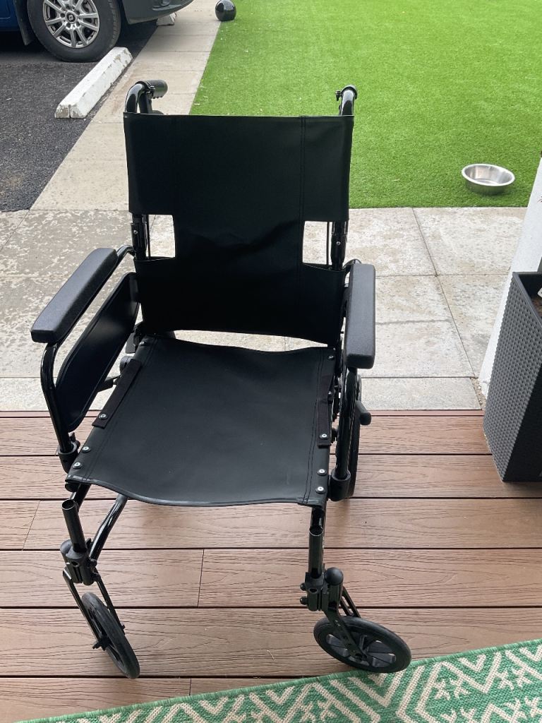 Lightweight Black Wheelchair – Good Condition