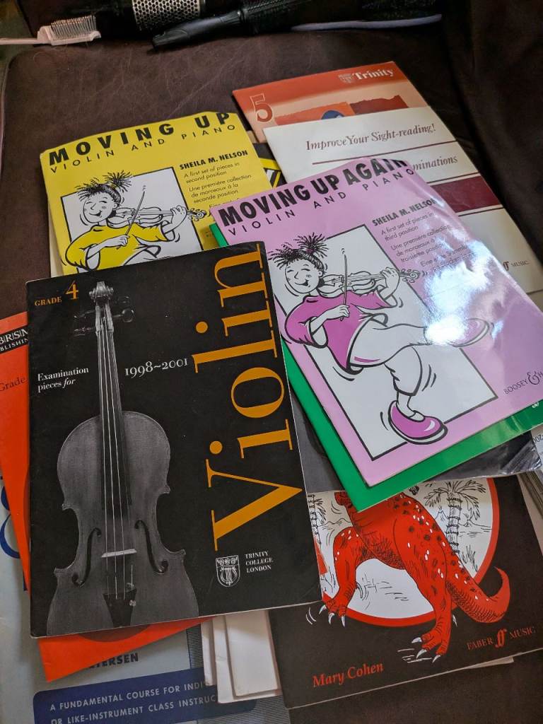 Music work books guitar piano violin 