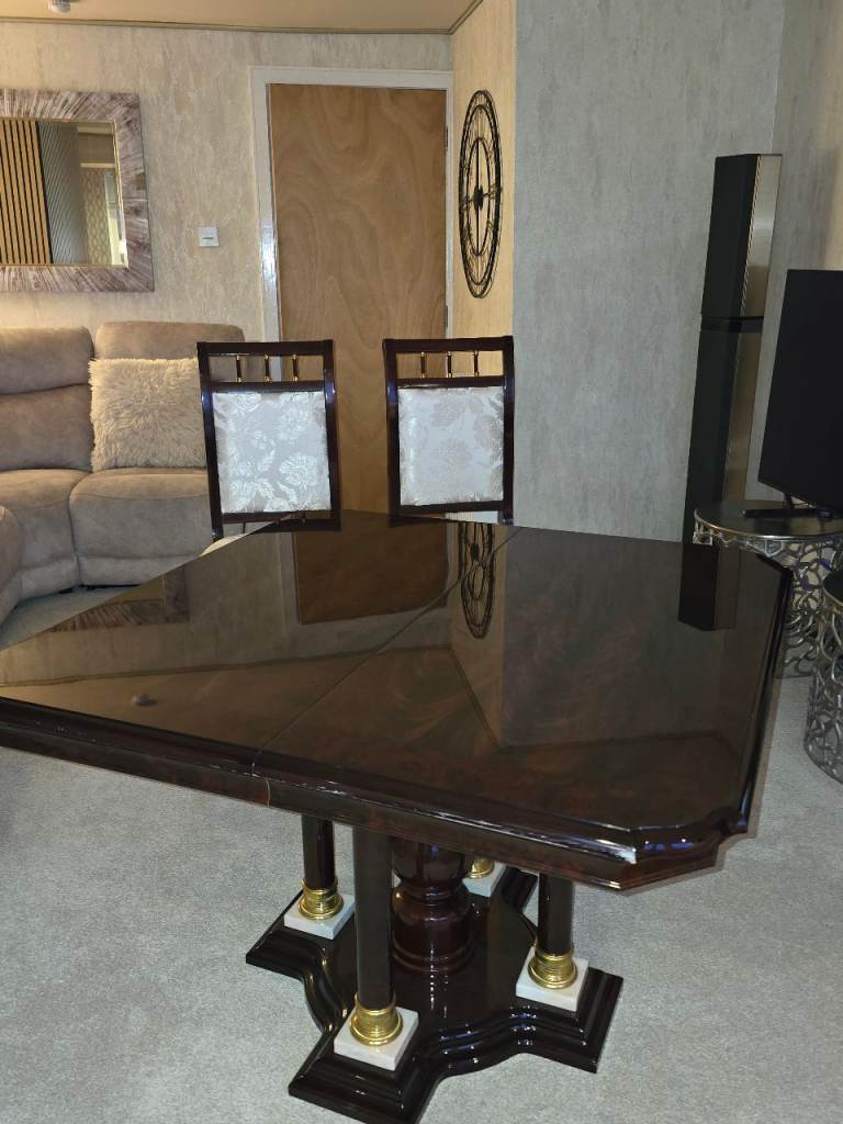 Dark Wood Dining Table with High-Gloss Finish and Column Legs