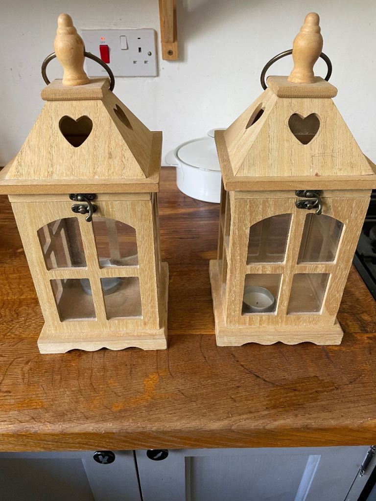 Pair of wooden candle lanterns