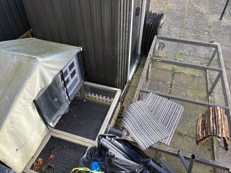 Used outdoor rabbit pet hutch and run with mesh run 